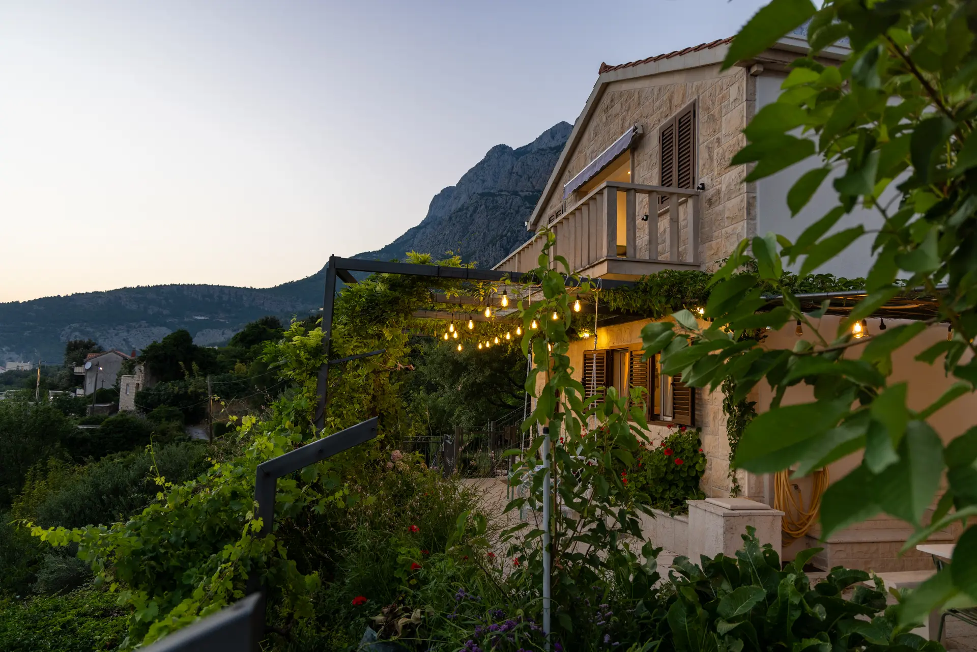 Stone villa with pergola beneath the Biokovo mountains